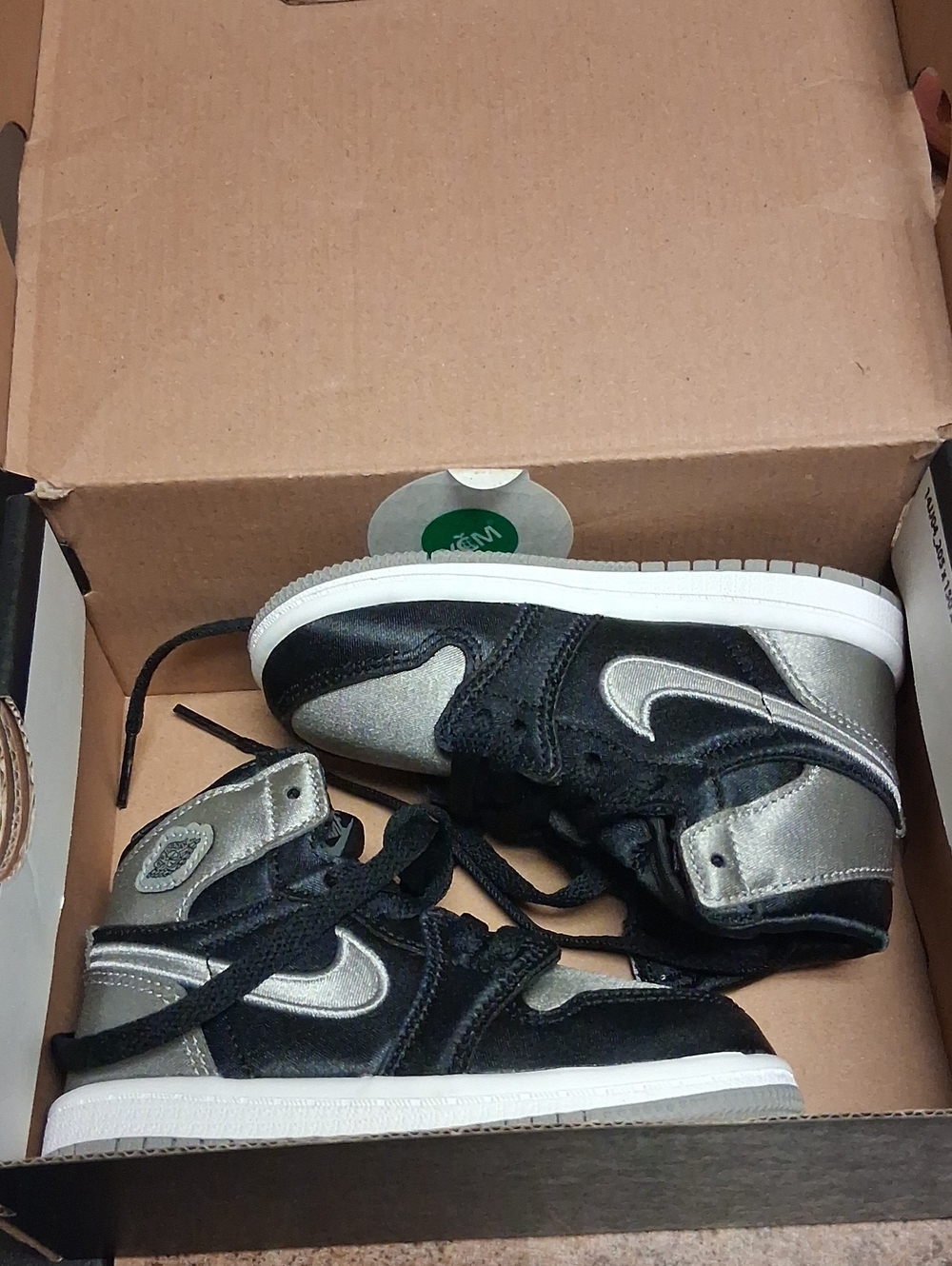 Nike Men’s Black and Silver High-Top Sneakers